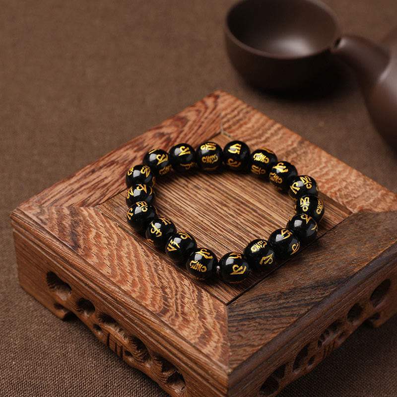 Pulsera de meditación Om Mani Padme Hum de ónix negro y cristal blanco del Tíbet Mythstone