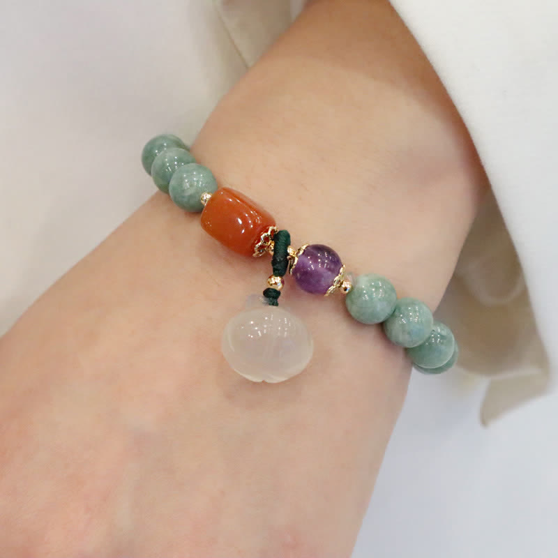 Pulsera curativa de cristal de amatista con hebilla de paz y loto de jade cian y calabaza Mythstone