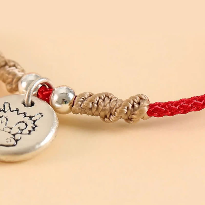 Pulsera trenzada con el signo de la suerte del año del dragón chino hecha a mano en plata de ley 999 de Mythstone 