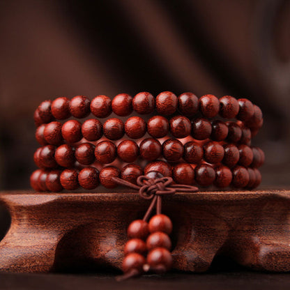 Pulsera de meditación con 108 cuentas de sándalo rojo y hojas pequeñas tibetanas Mythstone