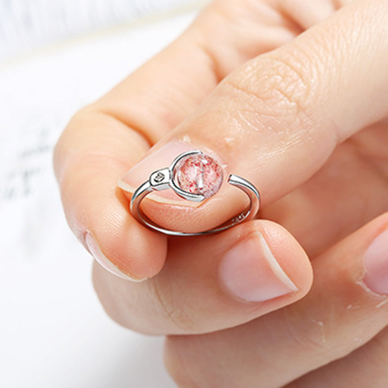 Anillo giratorio relajante de cristal rosa Mythstone 