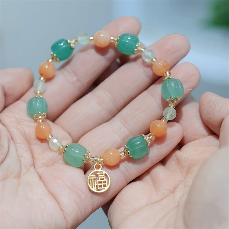 Pulsera de la riqueza con abalorios de calabaza de jade y seda dorada natural de Mythstone 