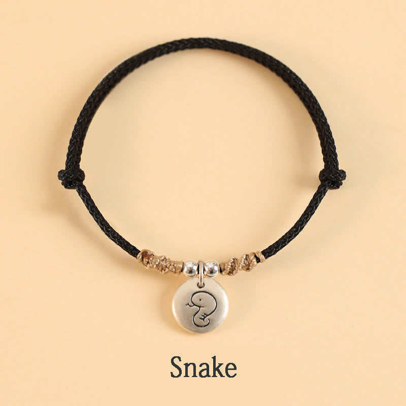 Pulsera trenzada con el signo de la suerte del año del dragón chino hecha a mano en plata de ley 999 de Mythstone 