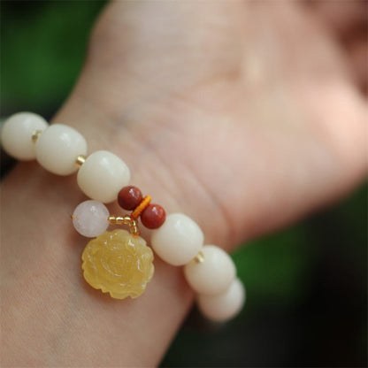 Pulsera de ámbar con semillas de bodhi y loto de la paz con degradado Mythstone