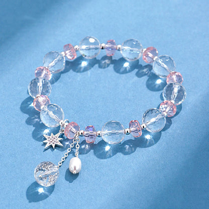 Pulsera con dije de estrella protectora de cristal blanco y rosa Mythstone