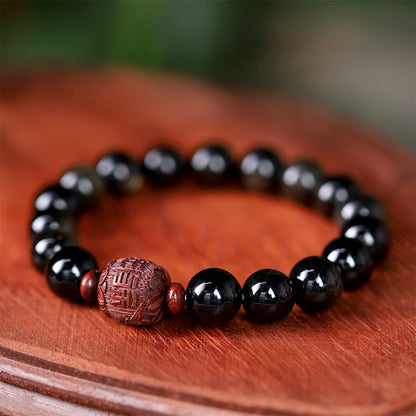 Pulsera curativa con personaje Om Mani Padme Hum Fu y obsidiana arcoíris con brillo dorado natural de Mythstone 