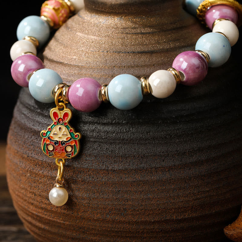 Pulsera de protección con cuentas de porcelana y ceniza de incienso de cristal de Liuli con cabeza de león y conejo, diosa de la riqueza tibetana Zakiram