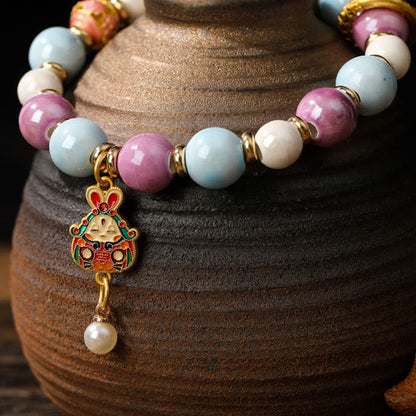 Pulsera de protección con cuentas de porcelana y ceniza de incienso de cristal de Liuli con cabeza de león y conejo, diosa de la riqueza tibetana Zakiram