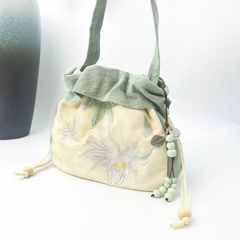 Bolso bandolera de lino y algodón con bordado de loto y magnolia de Mythstone Suzhou