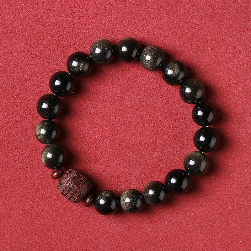 Pulsera curativa con personaje Om Mani Padme Hum Fu y obsidiana arcoíris con brillo dorado natural de Mythstone 