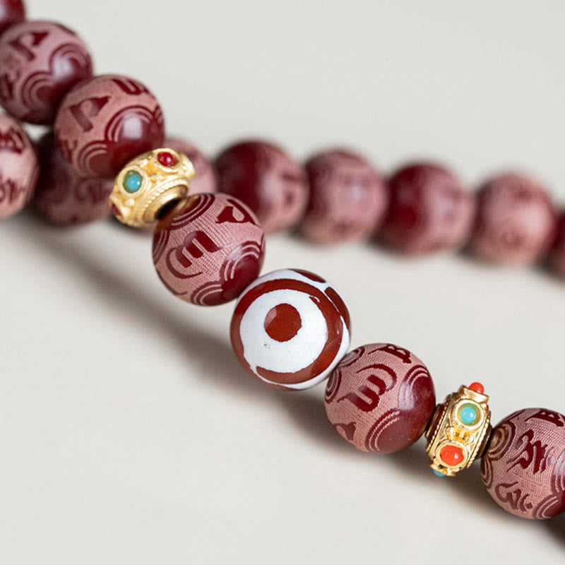 Pulsera de armonía grabada con semilla de bodhi roja de Mythstone Om Mani Padme Hum Lotus 