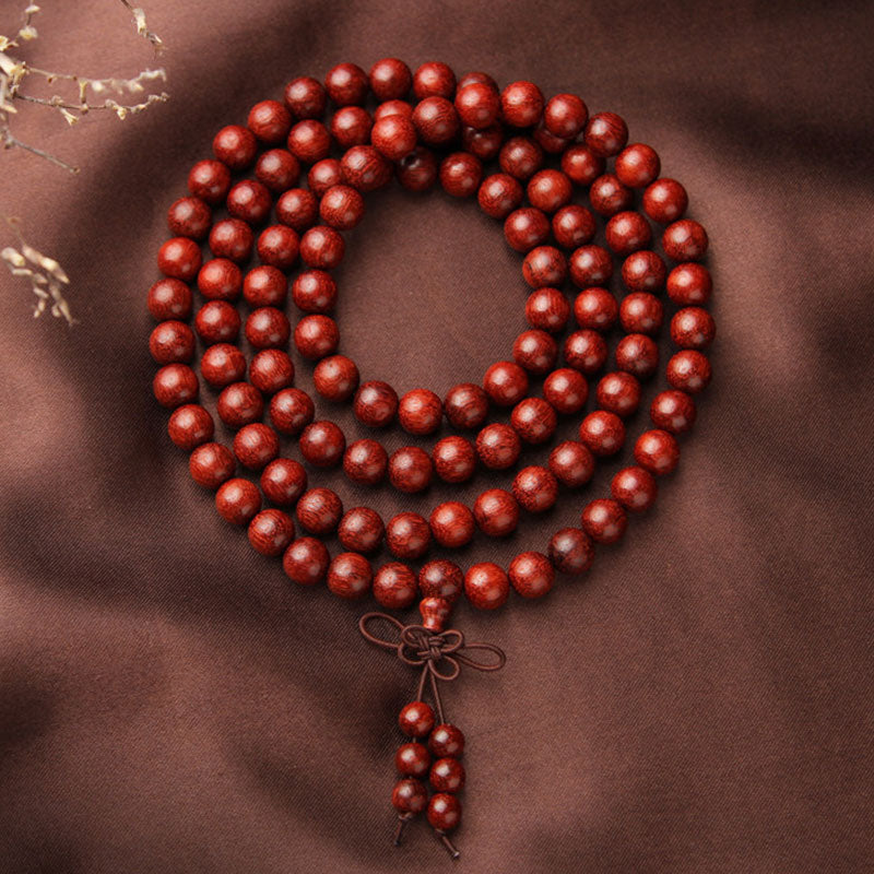 Pulsera de meditación con 108 cuentas de sándalo rojo y hojas pequeñas tibetanas Mythstone