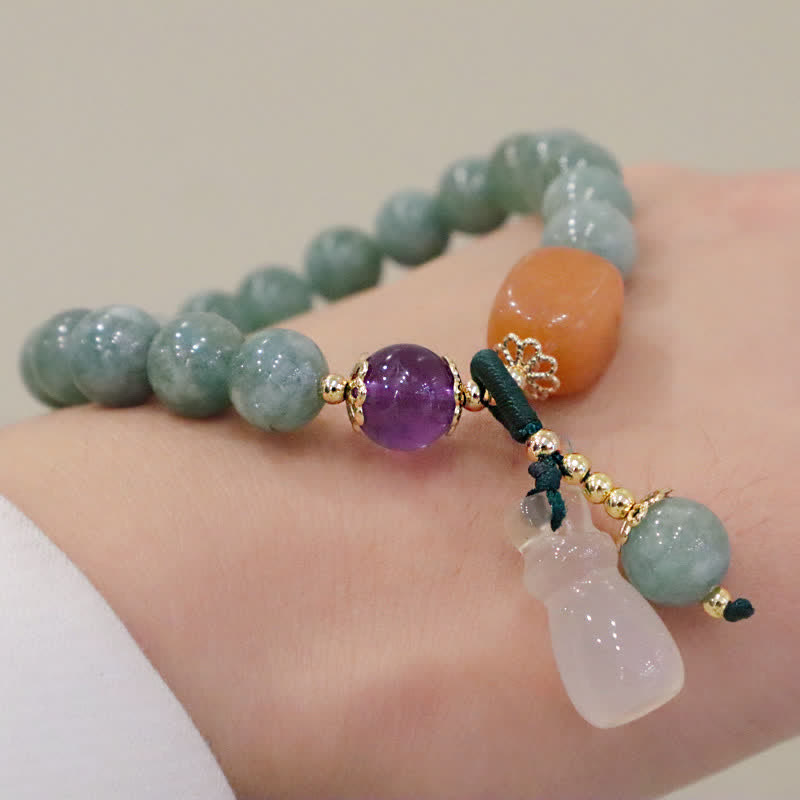 Pulsera curativa de cristal de amatista con hebilla de paz y loto de jade cian y calabaza Mythstone