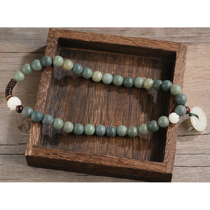 Pulsera de doble vuelta con hebilla de paz y sabiduría, semilla de bodhi, loto y jade cian