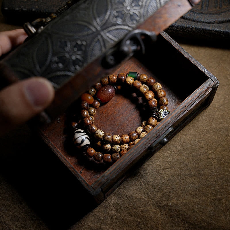 Pulsera de triple vuelta con cuentas de ámbar, dzi, semilla de Bodhi tibetano, ágata y zakiram, diosa de la riqueza