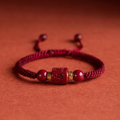 Pulsera trenzada con bendición grabada Om Mani Padme Hum y cinabrio tibetano Mythstone 