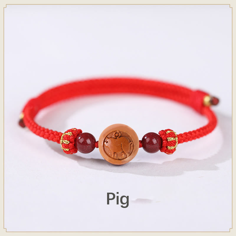 Mythstone Natural Peach Wood Chinese Zodiac Fu Character Carved Cinnabar Wealth Bracelet