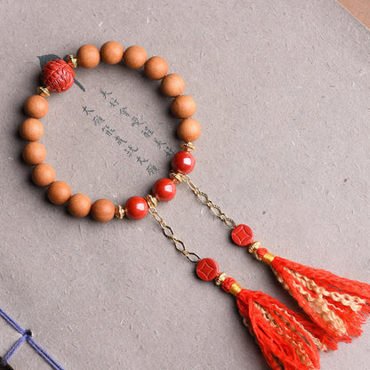 Pulsera de borlas de riqueza PiXiu con cinabrio de madera de melocotón natural tibetano Mythstone 