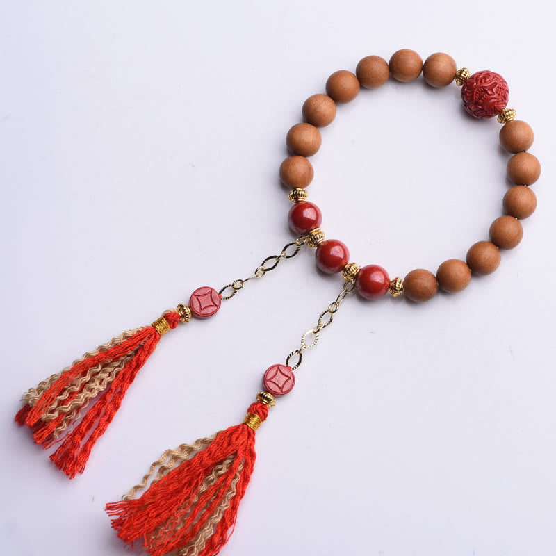 Pulsera de borlas de riqueza PiXiu con cinabrio de madera de melocotón natural tibetano Mythstone 