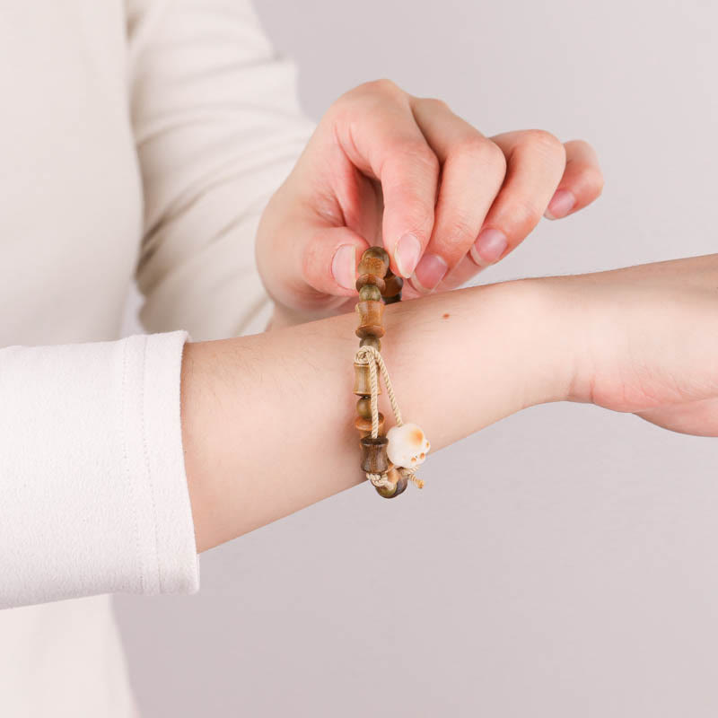 Pulsera de la paz de bambú con garra de gato y semilla de bodhi de sándalo verde Mythstone 