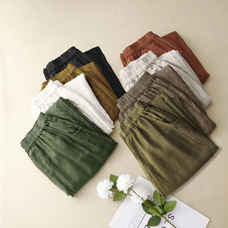 Pantalones harén con cintura elástica y bolsillos con encaje de color liso de Mythstone 