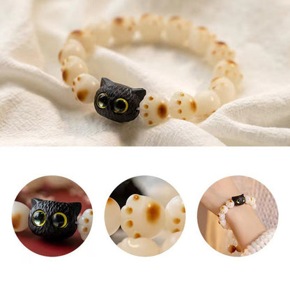 Pulsera de la paz con forma de gato de la suerte y pata encantadora con semilla de bodhi natural de Mythstone en madera de sándalo rojo 