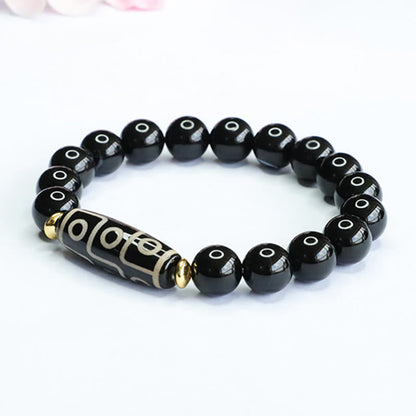 Pulsera de poder de ónix negro con cuentas tibetanas Dzi de nueve ojos Mythstone