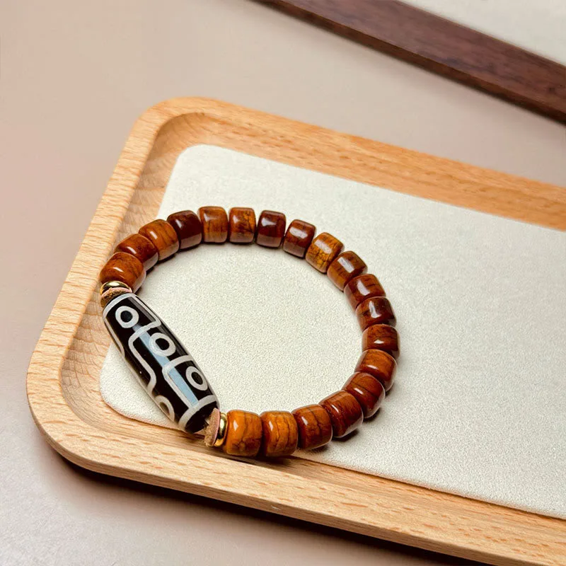 Mythstone Tibetan Yak Bone Nine-Eye Dzi Bead Protection Bracelet - Image 2