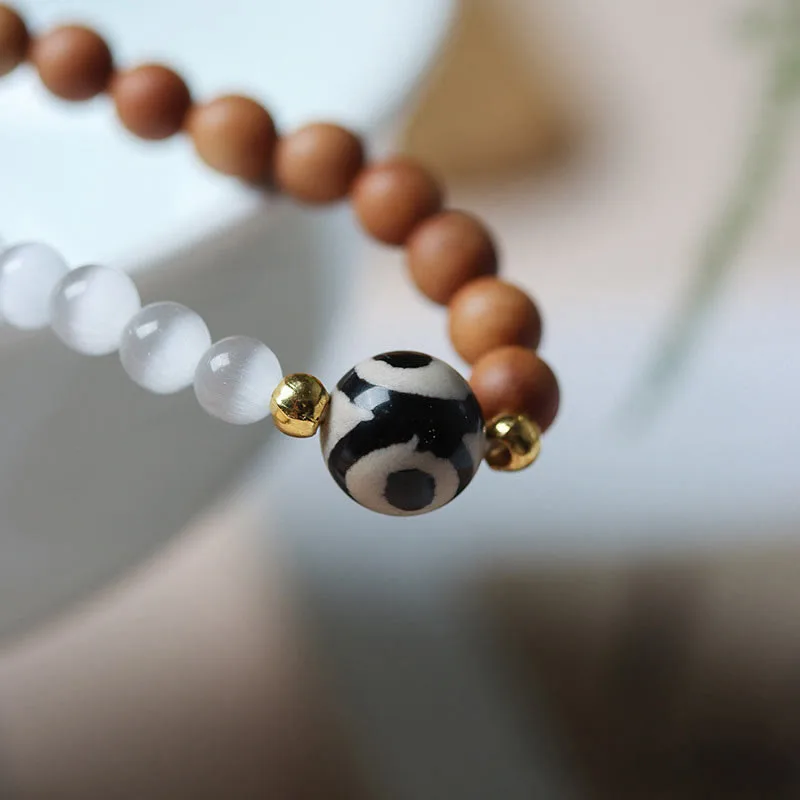 Mythstone Sandalwood Cat's Eye Three-eyed Dzi Bead Crystal Protectioin Bracelet - Image 4