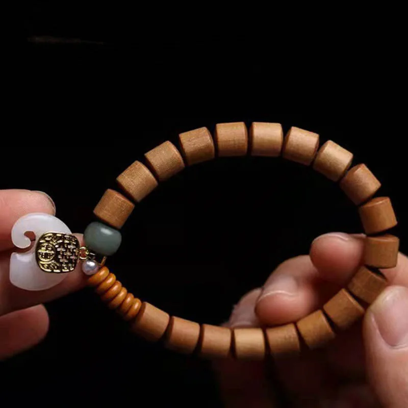 Mythstone Sandalwood Jade Elephant Protection Bracelet - Image 7