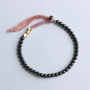 Mythstone Handmade Tibetan Black Onyx Tassel Bracelet