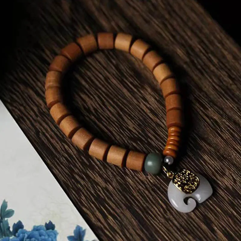 Mythstone Sandalwood Jade Elephant Protection Bracelet - Image 11