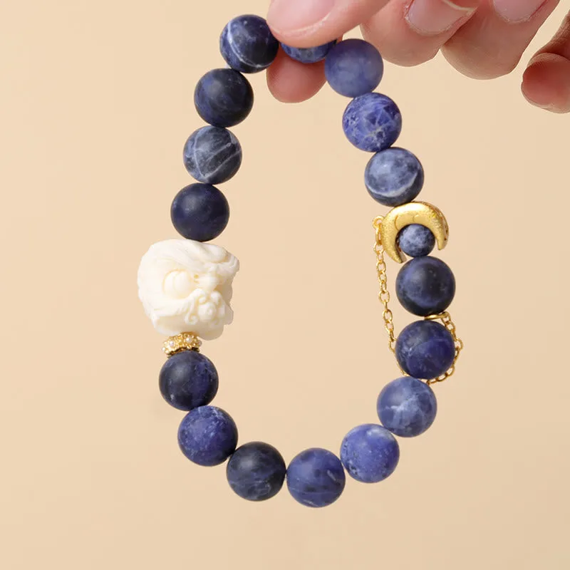 Mythstone Sodalite Ivory Fruit Dancing Lion Crescent Moon Harmony Bracelet - Image 2