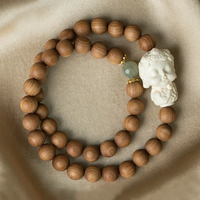 Mythstone Sandalwood Hetian Jade Ivory Fruit Green Tara Protection Bracelet - Image 4